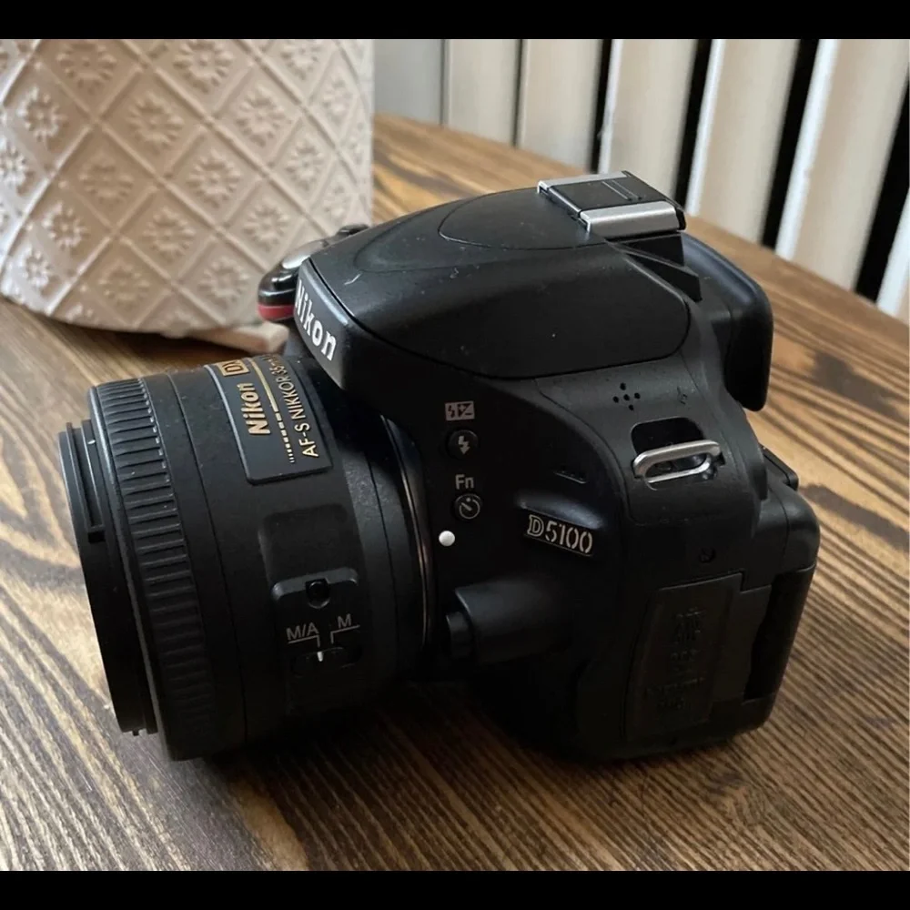 Nikon D5100 with 35mm 1.8 Lens- lightly used